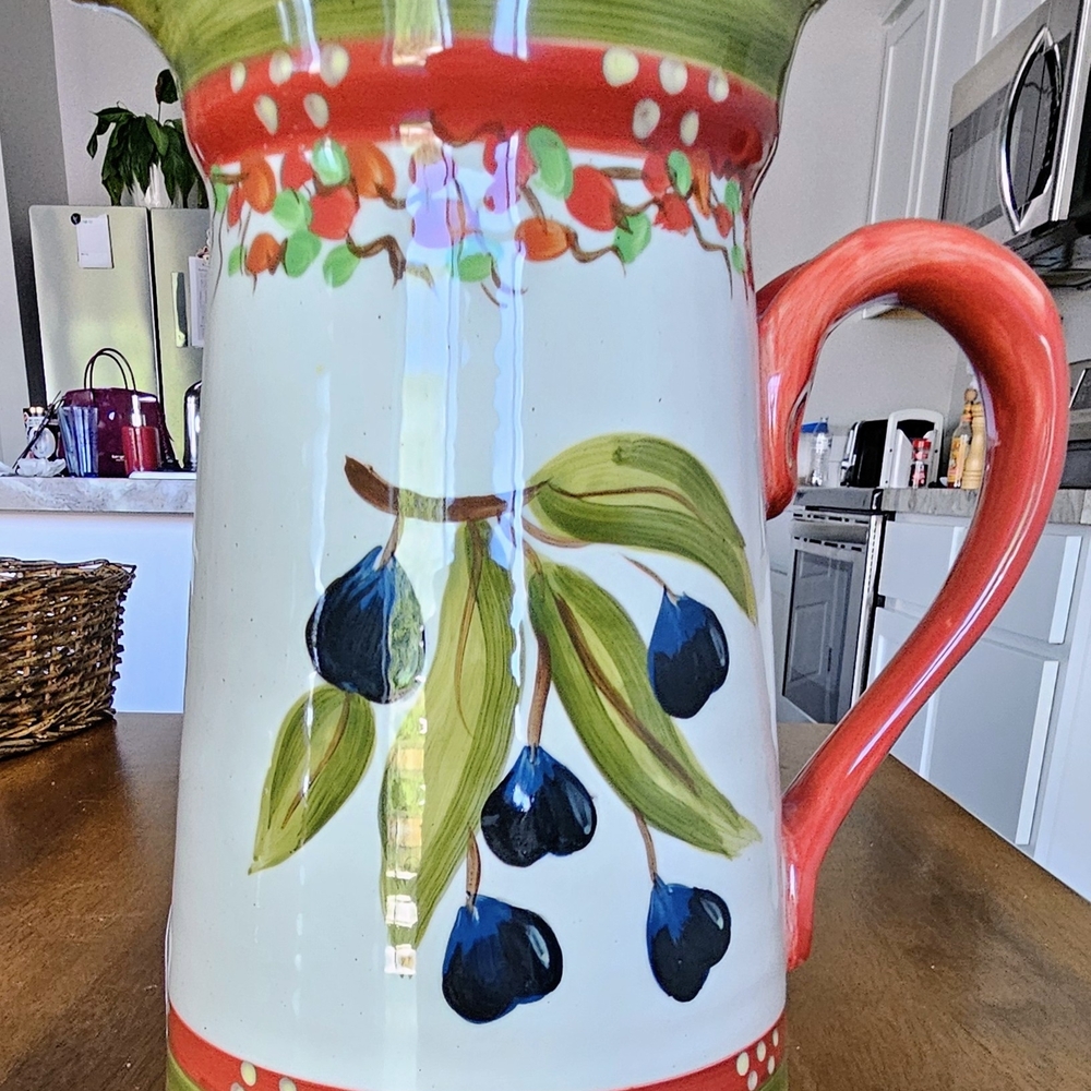 Hand-Painted Ceramic Pitcher with Red and Green Accents